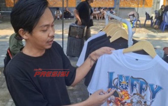 
					Kontroversi Soal “One Piece”, Pedagang T-Shirt di Kota Metro Kebanjiran Pembeli